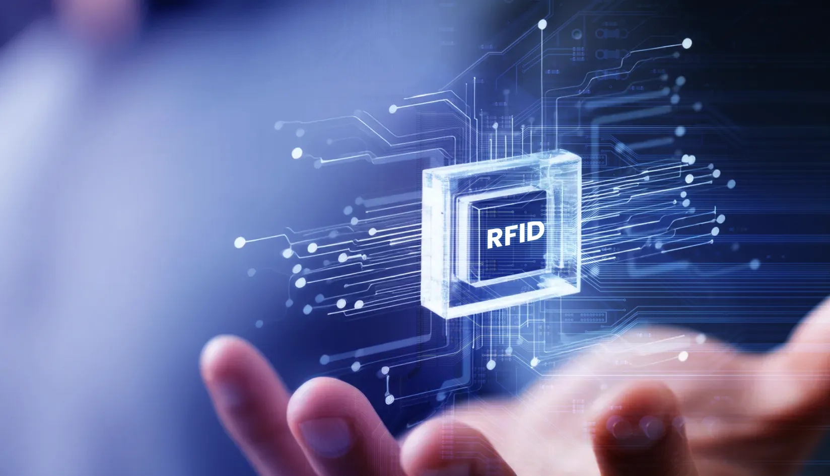 The Anatomy of an RFID Tag: Microchip, Antenna, and Substrate Diagram of an RFID tag anatomy: a silicon microchip connected to a coiled aluminum antenna, all mounted on a white PET plastic substrate.